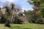 Located in the heart of a park with artificial lake, viticultural property